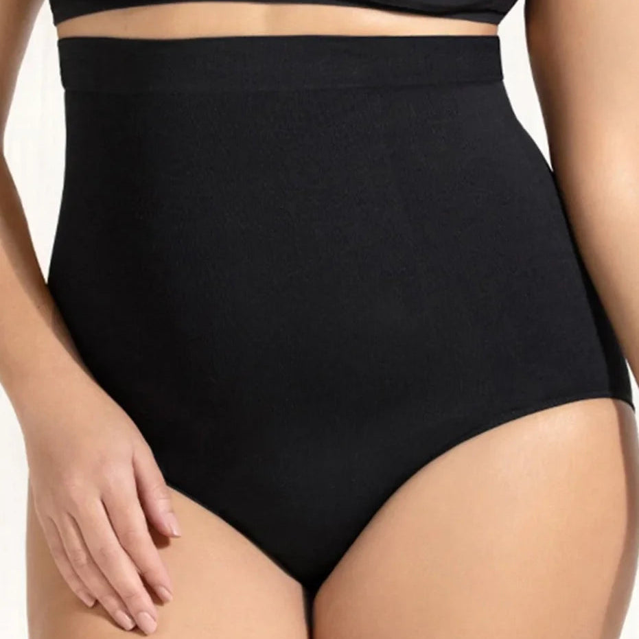 Black high-waisted underwear worn by a person on a plain background